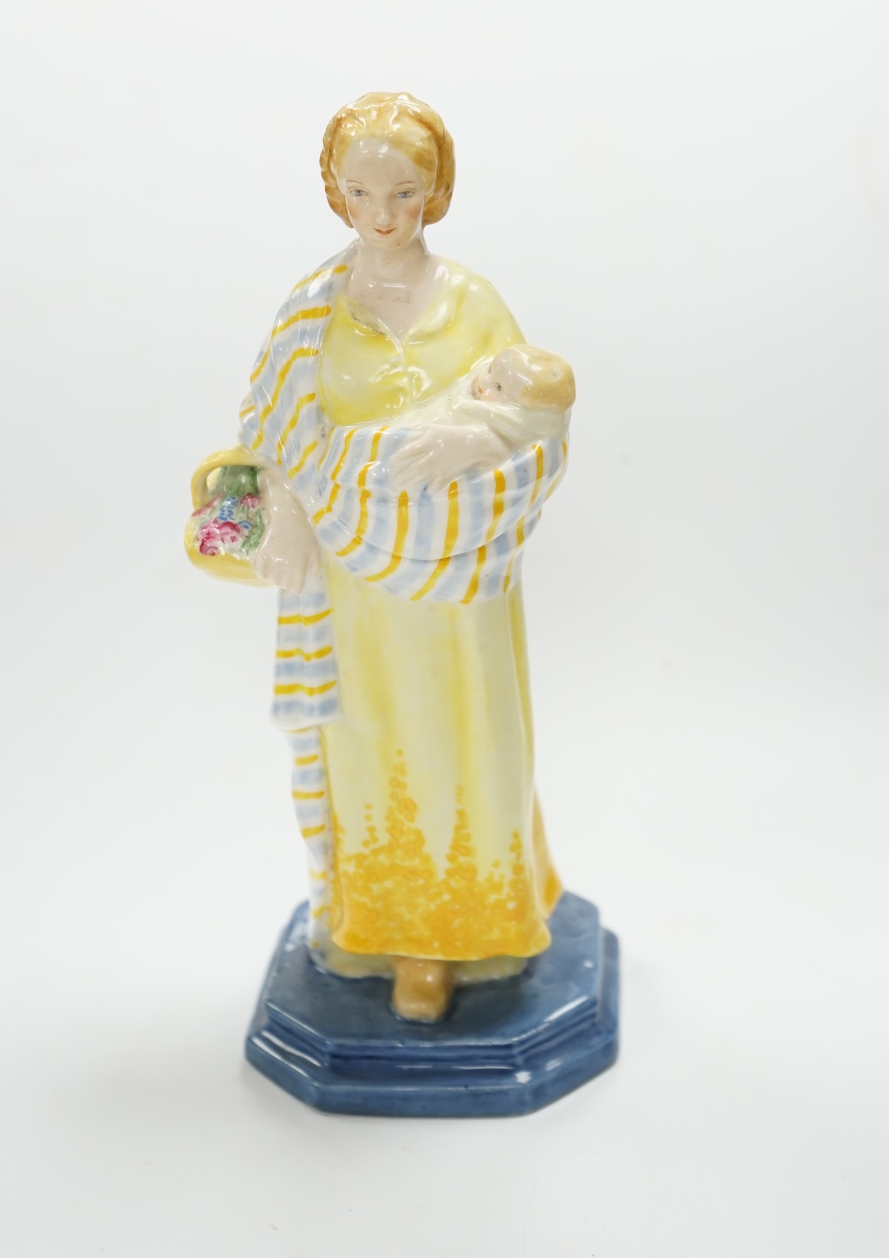 A Royal Worcester figure, 'A Flower girl', modelled by Phoebe Stabler, 20.5cm high. Condition - good